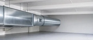 Clean sealed commercial ductwork in a tidy ceiling void.